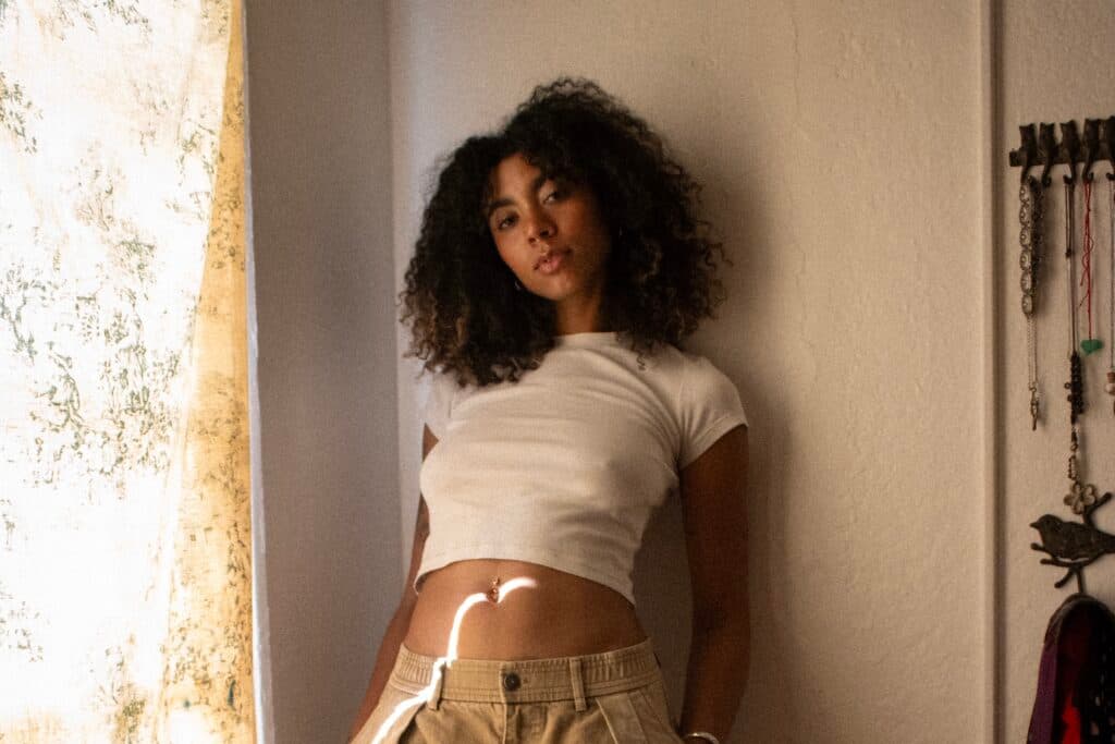 “This Time I Intend to Swim”: Satya Comes Home to Herself on ‘Yellow House,’ a Soul-Stirring Debut of Healing, Love, & Release