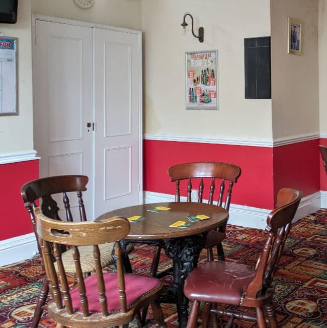 The history and meaning of the cast-iron Britannia pub table